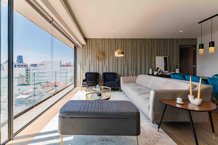 Mexico City Mexico CityのBuilding Calle Arquímedes - viva-houses-beyond-corp - 1258773 - MEXのアパートメントにある、モダンな家具を備えたエレガントなデザインのリビングルーム