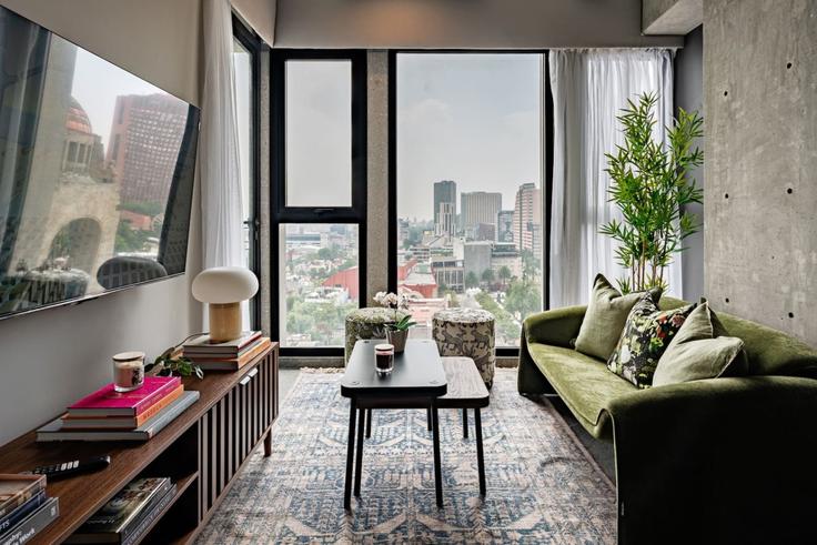 Mexico City Mexico CityのBuilding José María Iglesias - viva-houses-beyond-corp - 1585140のアパートメントにある、モダンな家具を備えたエレガントなデザインのリビングルーム Mexico City Mexico CityのBuilding José María Iglesias - viva-houses-beyond-corp - 1585140のアパートメントにある、モダンな家具を備えたエレガントなデザインのリビングルーム