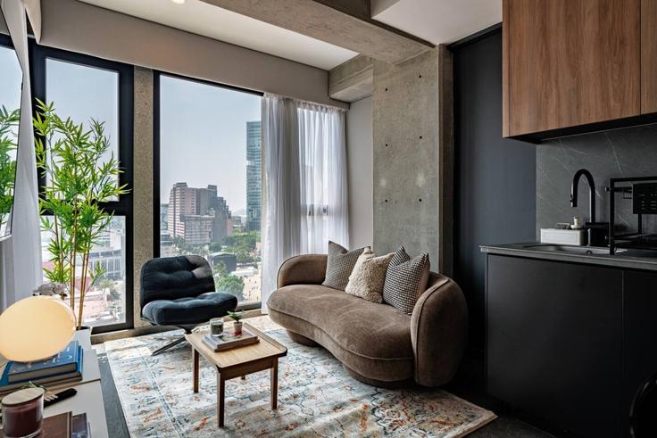 Mexico City Mexico CityのBuilding José María Iglesias - viva-houses-beyond-corp - 1585139のアパートメントにある、モダンな家具を備えたエレガントなデザインのリビングルーム Mexico City Mexico CityのBuilding José María Iglesias - viva-houses-beyond-corp - 1585139のアパートメントにある、モダンな家具を備えたエレガントなデザインのリビングルーム