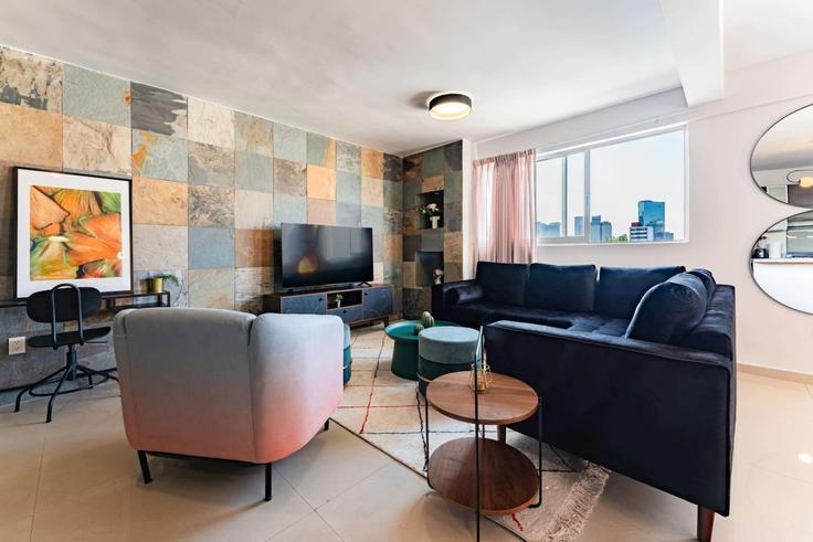 Elegant gestaltetes Wohnzimmer mit moderner Einrichtung in einer Wohnung im Building Avenida Álvaro Obregón - viva-houses-beyond-corp - 1592260 in Mexico City, Mexico City