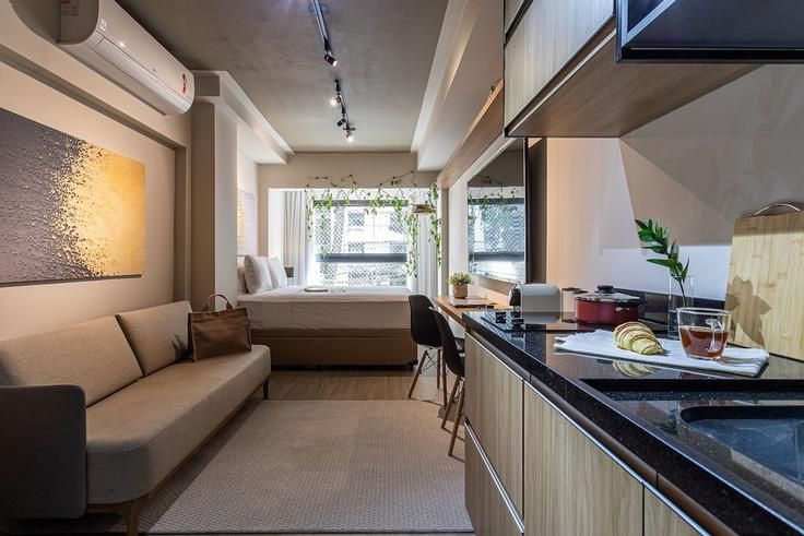 Sala de estar elegantemente projetada com móveis modernos em um apartamento no Building Rua Balthazar da Veiga - viva - 1521167 em Vila Nova Conceição, São Paulo Sala de estar elegantemente projetada com móveis modernos em um apartamento no Building Rua Balthazar da Veiga - viva - 1521167 em Vila Nova Conceição, São Paulo