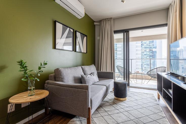 Elegantly designed living room with modern furnishings in an apartment at Building Rua Doutor Alceu de Campos Rodrigues - viva - 1521164 in Vila Nova Conceição, São Paulo