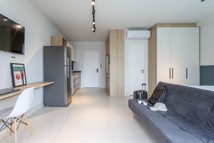 Elegante sala de estar con mobiliario moderno en un apartamento en Building Rua Arminda - viva - 1521194 en Vila Nova Conceição, São Paulo