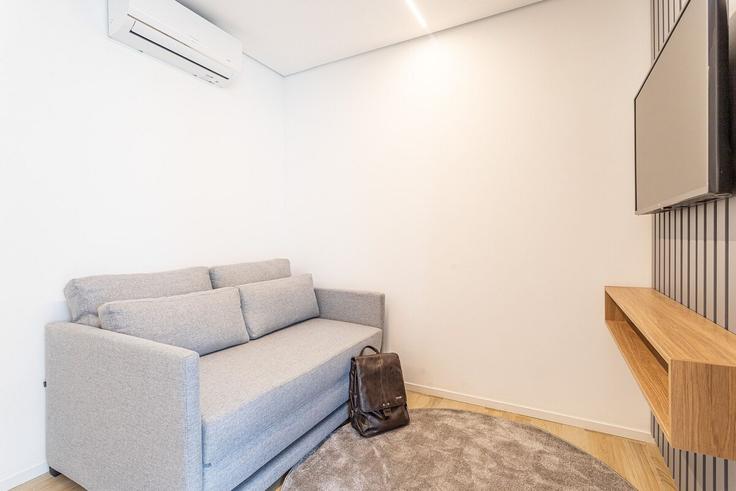 Sala de estar elegantemente projetada com móveis modernos em um apartamento no Building Alameda Jaú - viva - 1521210 em Jardim Paulista, São Paulo