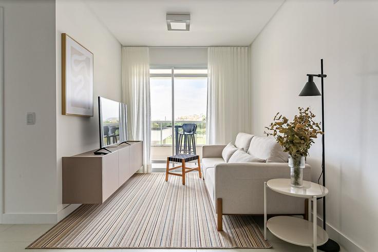 Salle de séjour élégante avec mobilier moderne dans un appartement à Building Rua dos Canudos - viva - 1521083 à Ingleses Norte, Florianópolis Salle de séjour élégante avec mobilier moderne dans un appartement à Building Rua dos Canudos - viva - 1521083 à Ingleses Norte, Florianópolis