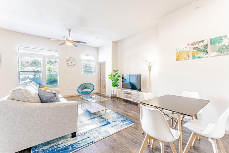 Elegantly designed living room with modern furnishings in an apartment at Building Montopolis Drive - vivant - 1462806 in Austin, Austin