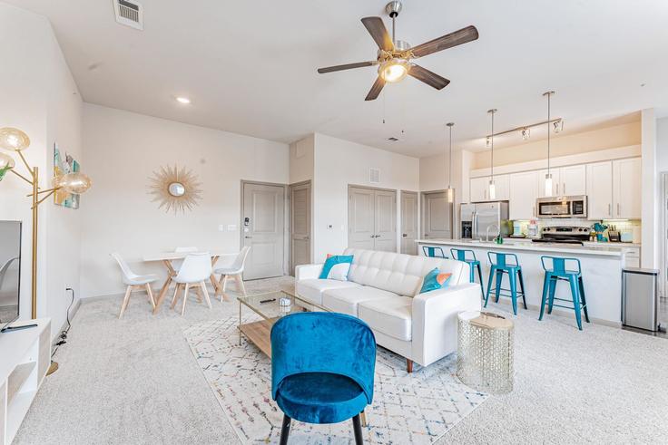 Elegantly designed living room with modern furnishings in an apartment at Building Grove Boulevard - vivant - 1462808 in Austin, Austin