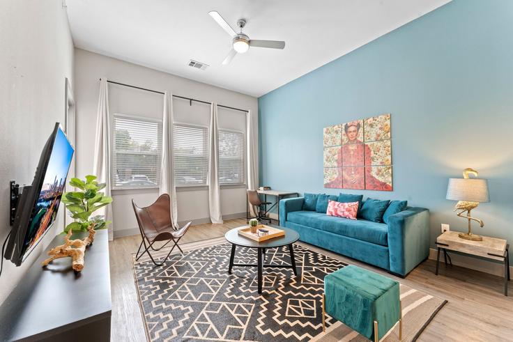 Elegantly designed living room with modern furnishings in an apartment at Building East Riverside Drive - vivant - 1462803 in Austin, Austin