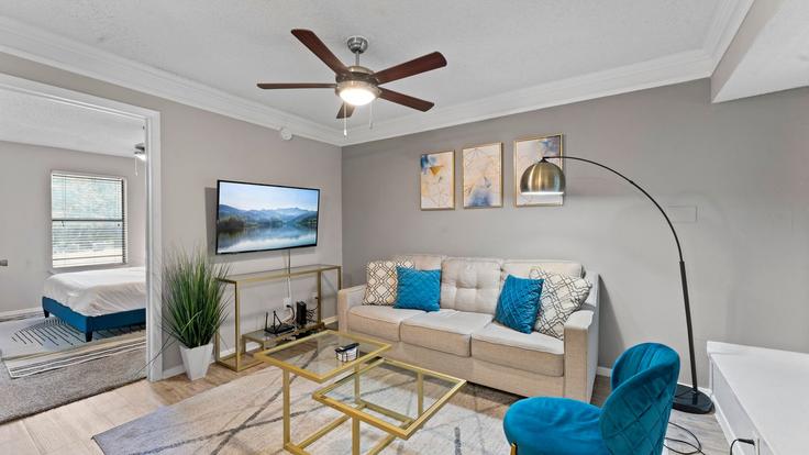 Elegantly designed living room with modern furnishings in an apartment at Building North Lamar Boulevard - vivant - 1462756 in Austin, Austin