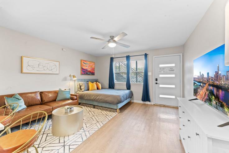 Elegantly designed living room with modern furnishings in an apartment at Building Great Northern Boulevard - vivant - 1462749 in Austin, Austin