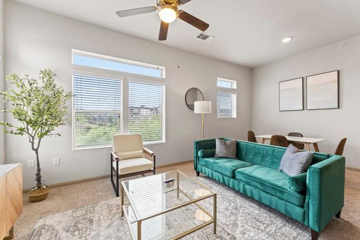 Elegantly designed living room with modern furnishings in an apartment at Building Grove Boulevard - vivant - 1462740 in Austin, Austin