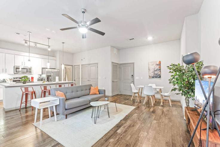 Elegantly designed living room with modern furnishings in an apartment at Building Grove Boulevard - vivant - 1462783 in Austin, Austin