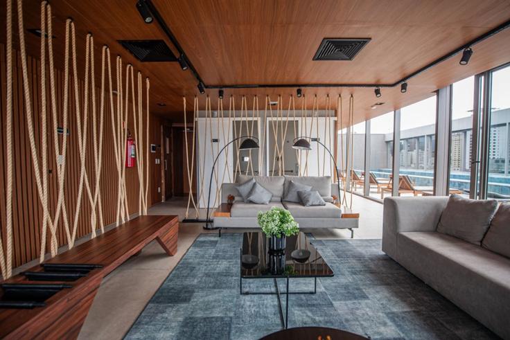 Salle de séjour élégante avec mobilier moderne dans un appartement à Building Avenida Nove de Julho - wecare-hosting - 1559139 à Jardim Paulista, São Paulo Salle de séjour élégante avec mobilier moderne dans un appartement à Building Avenida Nove de Julho - wecare-hosting - 1559139 à Jardim Paulista, São Paulo