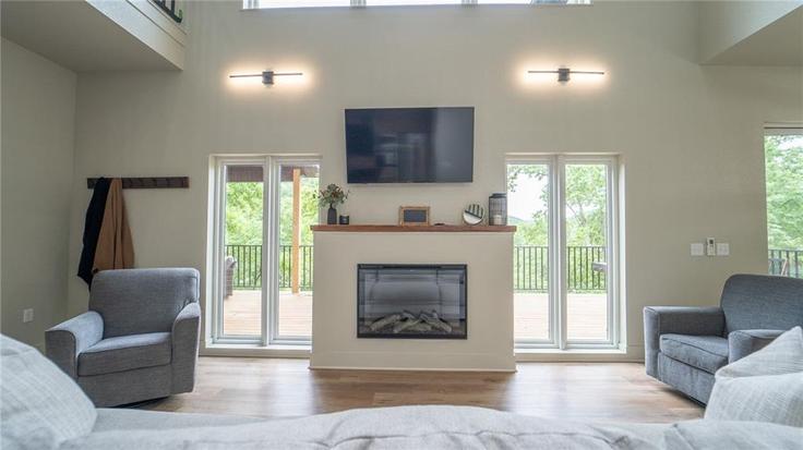 Sala de estar elegantemente projetada com móveis modernos em um apartamento no Building Jasper Lane - weekender-management - 1631804 em Rogers, Rogers Sala de estar elegantemente projetada com móveis modernos em um apartamento no Building Jasper Lane - weekender-management - 1631804 em Rogers, Rogers