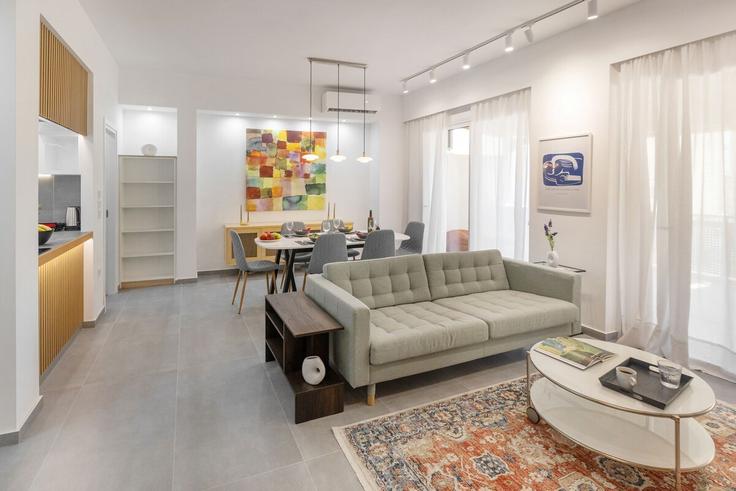 Elegant gestaltetes Wohnzimmer mit moderner Einrichtung in einer Wohnung im Building Αμεινοκλέους - wehost-athens-ike - 1648206 in Central Athens, Athens Elegant gestaltetes Wohnzimmer mit moderner Einrichtung in einer Wohnung im Building Αμεινοκλέους - wehost-athens-ike - 1648206 in Central Athens, Athens