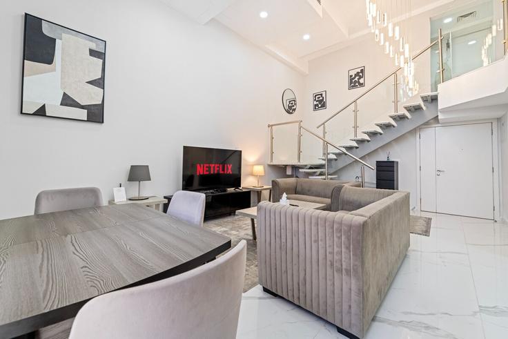 Elegantly designed living room with modern furnishings in an apartment at Building Tariaq Bedon Esm - welcome-home - 1506303 in Dubai Marina, Dubai Elegantly designed living room with modern furnishings in an apartment at Building Tariaq Bedon Esm - welcome-home - 1506303 in Dubai Marina, Dubai