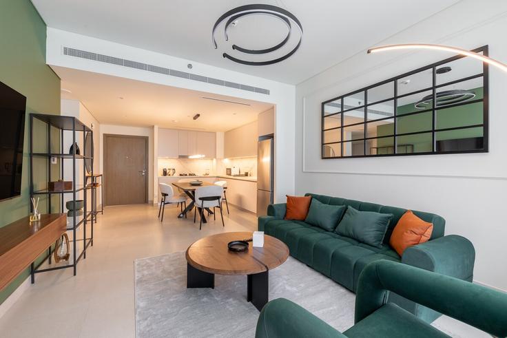 Dubai Marsa DubaiのBuilding Tariaq Bedon Esm - welcome-home - 1506298のアパートメントにある、モダンな家具を備えたエレガントなデザインのリビングルーム