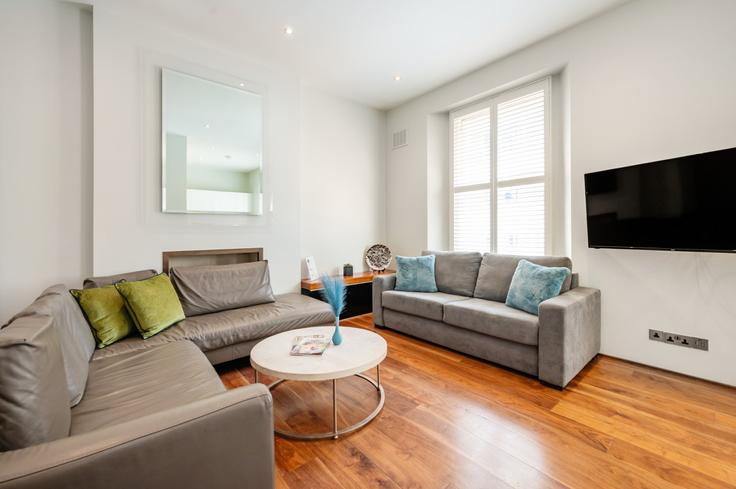 Salle de séjour élégante avec mobilier moderne dans un appartement à Building Emperor's Gate - welcome-london-ltd - 1511497 à Royal Borough of Kensington and Chelsea, London Salle de séjour élégante avec mobilier moderne dans un appartement à Building Emperor's Gate - welcome-london-ltd - 1511497 à Royal Borough of Kensington and Chelsea, London