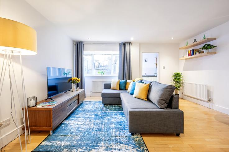 Elegante sala de estar con mobiliario moderno en un apartamento en Building Saint Martin's Lane - welcome-london-ltd - 1511517 en City of Westminster, London Elegante sala de estar con mobiliario moderno en un apartamento en Building Saint Martin's Lane - welcome-london-ltd - 1511517 en City of Westminster, London