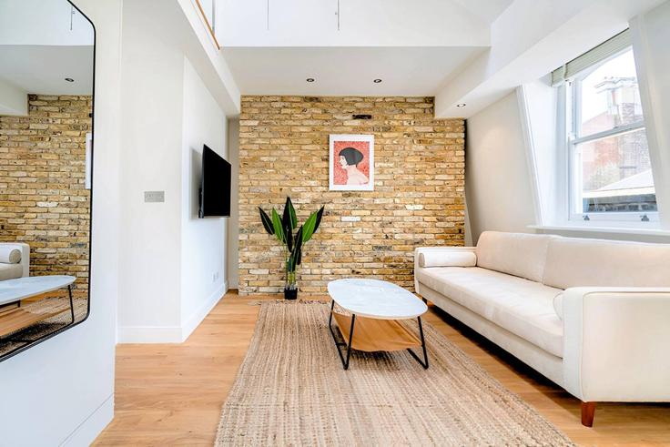 City of Westminster, London에 위치한 Building King Street - welcome-london-ltd - 1511561 유닛의 세련된 인테리어가 돋보이는 거실 City of Westminster, London에 위치한 Building King Street - welcome-london-ltd - 1511561 유닛의 세련된 인테리어가 돋보이는 거실