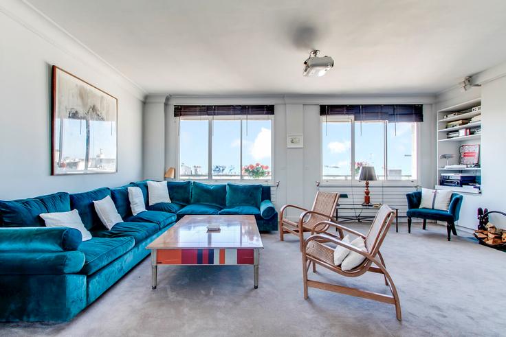 Elegante sala de estar con mobiliario moderno en un apartamento en Building Rue Cassette - welcome2france - 183631 en 6th arrondissement, Paris Elegante sala de estar con mobiliario moderno en un apartamento en Building Rue Cassette - welcome2france - 183631 en 6th arrondissement, Paris