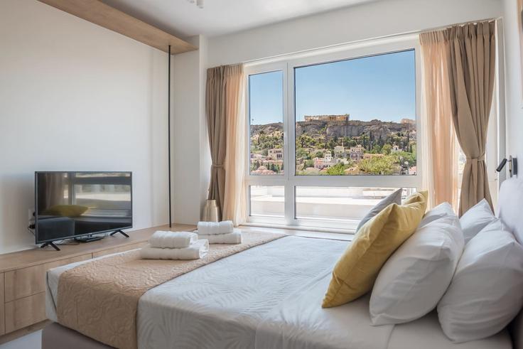 Elegante sala de estar con mobiliario moderno en un apartamento en Building Ermou - welcomehost - 1223192 - ATH en Central Athens, Athens Elegante sala de estar con mobiliario moderno en un apartamento en Building Ermou - welcomehost - 1223192 - ATH en Central Athens, Athens