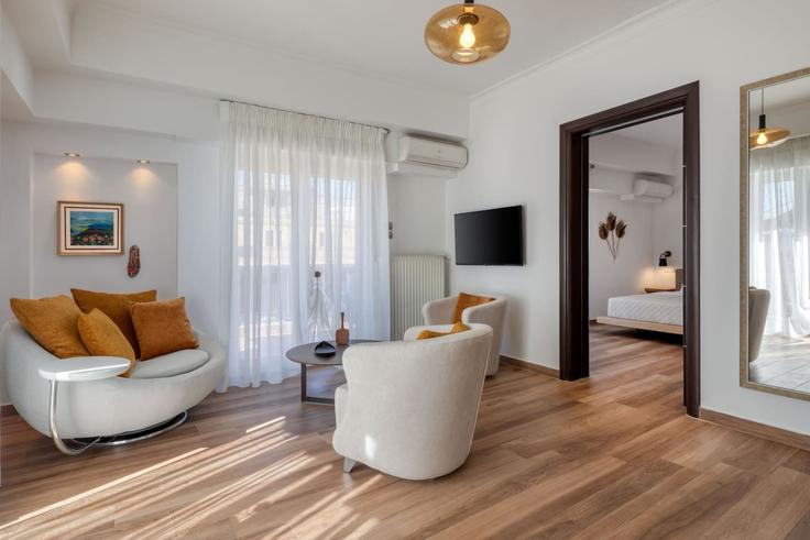 Elegante sala de estar con mobiliario moderno en un apartamento en Building Ipsilantou - welcomehost - 1223218 - ATH en Central Athens, Athens Elegante sala de estar con mobiliario moderno en un apartamento en Building Ipsilantou - welcomehost - 1223218 - ATH en Central Athens, Athens