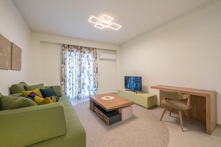 Building Georgiou Papandreou - welcomehost - 1541039 adresindeki bir dairede modern mobilyalarla zarif bir şekilde tasarlanmış oturma odası Central Athens, Athens Building Georgiou Papandreou - welcomehost - 1541039 adresindeki bir dairede modern mobilyalarla zarif bir şekilde tasarlanmış oturma odası Central Athens, Athens