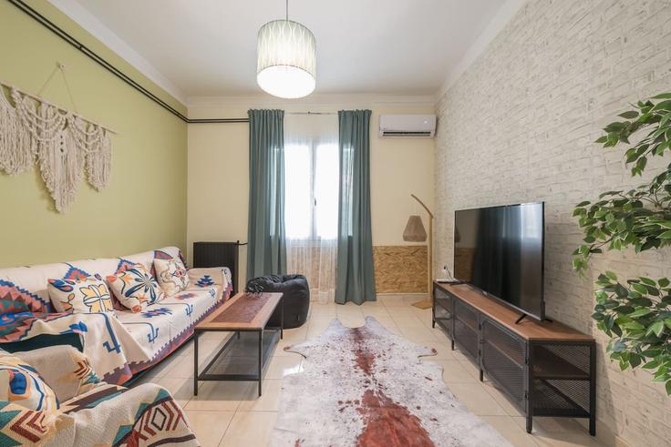 South Athens, Athens에 위치한 Building Panagi Tsaldari - welcomehost - 1223093 - ATH 아파트의 세련된 인테리어가 돋보이는 거실 South Athens, Athens에 위치한 Building Panagi Tsaldari - welcomehost - 1223093 - ATH 아파트의 세련된 인테리어가 돋보이는 거실