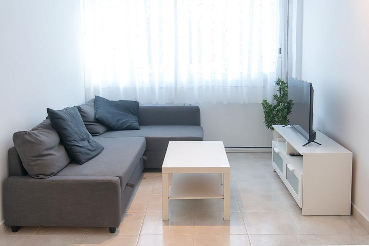 Platja d'Aro i S'Agaró, Platja d'Aro i S'Agaró에 위치한 Building Avinguda Onze de Setembre - welcs - 1328305 유닛의 세련된 인테리어가 돋보이는 거실 Platja d'Aro i S'Agaró, Platja d'Aro i S'Agaró에 위치한 Building Avinguda Onze de Setembre - welcs - 1328305 유닛의 세련된 인테리어가 돋보이는 거실