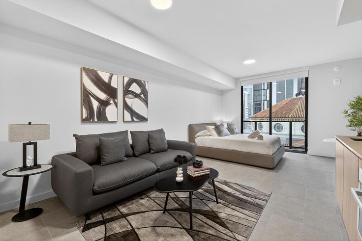 Elegante sala de estar con mobiliario moderno en un apartamento en Building Northeast 5th Street - whost - 1470511 en Miami, Miami Elegante sala de estar con mobiliario moderno en un apartamento en Building Northeast 5th Street - whost - 1470511 en Miami, Miami