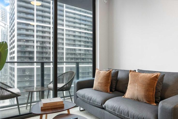 Elegantly designed living room with modern furnishings in an apartment at Building Northeast 5th Street - whost - 1503182 in Miami, Miami Elegantly designed living room with modern furnishings in an apartment at Building Northeast 5th Street - whost - 1503182 in Miami, Miami