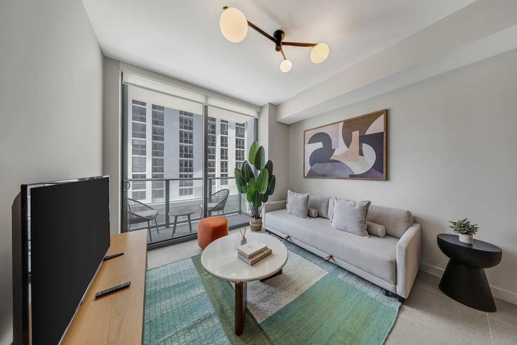 Salle de séjour élégante avec mobilier moderne dans un appartement à Building Northeast 6th Street - whost - 1520186 à Miami, Miami Salle de séjour élégante avec mobilier moderne dans un appartement à Building Northeast 6th Street - whost - 1520186 à Miami, Miami
