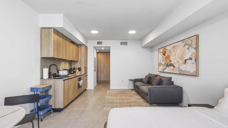 Elegante sala de estar con mobiliario moderno en un apartamento en Building Northeast 5th Street - whost - 1496947 en Miami, Miami Elegante sala de estar con mobiliario moderno en un apartamento en Building Northeast 5th Street - whost - 1496947 en Miami, Miami