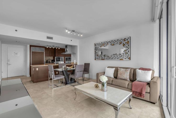 Elegantly designed living room with modern furnishings in an apartment at Building Brickell Avenue - whost - 1536419 in Miami, Miami