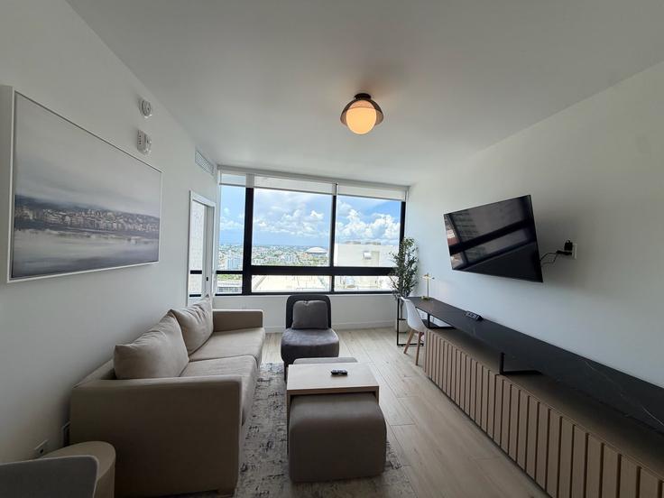 Elegantly designed living room with modern furnishings in an apartment at Building North Miami Avenue - whost - 1625716 in Miami, Miami