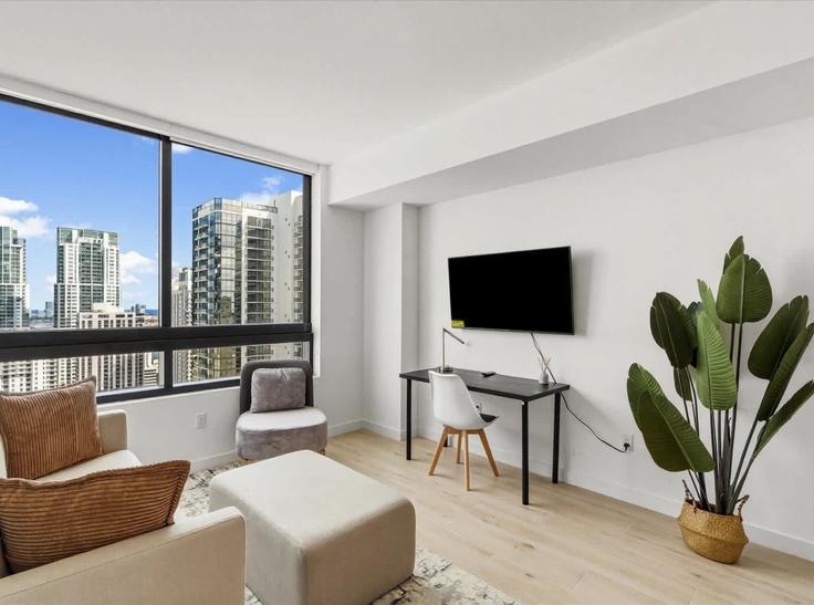 Elegant gestaltetes Wohnzimmer mit moderner Einrichtung in einer Wohnung im Building North Miami Avenue - whost - 1396878 in Miami, Miami Elegant gestaltetes Wohnzimmer mit moderner Einrichtung in einer Wohnung im Building North Miami Avenue - whost - 1396878 in Miami, Miami