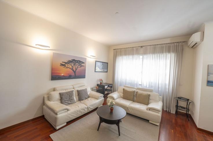 Rome, Rome에 위치한 Building Via Gregorio VII - wonderwheretostaycom - 1335951 아파트의 세련된 인테리어가 돋보이는 거실 Rome, Rome에 위치한 Building Via Gregorio VII - wonderwheretostaycom - 1335951 아파트의 세련된 인테리어가 돋보이는 거실