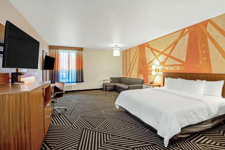 Elegant gestaltetes Wohnzimmer mit moderner Einrichtung in einer Wohnung im Building South 10th Street - wyndham - 1674216 in Waco, Waco Elegant gestaltetes Wohnzimmer mit moderner Einrichtung in einer Wohnung im Building South 10th Street - wyndham - 1674216 in Waco, Waco