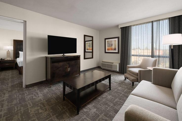 Elegantly designed living room with modern furnishings in an apartment at Building Date Avenue - wyndham - 1666466 in North Highlands, North Highlands
