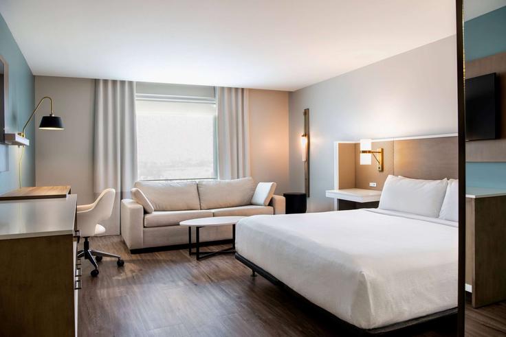 Winnipeg WinnipegのBuilding Kensington Street - wyndham - 1680037のアパートメントにある、モダンな家具を備えたエレガントなデザインのリビングルーム Winnipeg WinnipegのBuilding Kensington Street - wyndham - 1680037のアパートメントにある、モダンな家具を備えたエレガントなデザインのリビングルーム