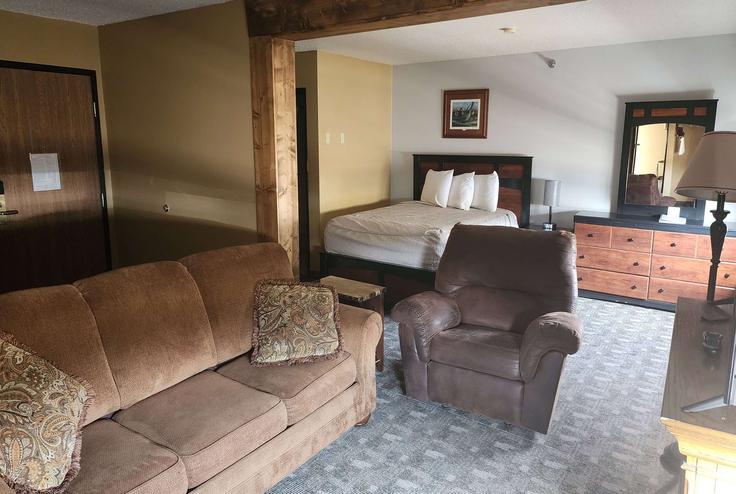 Pierre PierreのBuilding West Sioux Avenue - wyndham - 1679512のアパートメントにある、モダンな家具を備えたエレガントなデザインのリビングルーム Pierre PierreのBuilding West Sioux Avenue - wyndham - 1679512のアパートメントにある、モダンな家具を備えたエレガントなデザインのリビングルーム