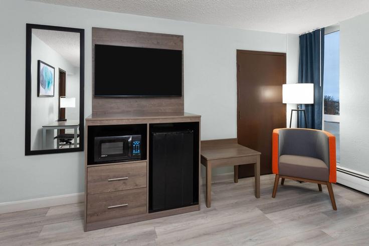 Elegantly designed living room with modern furnishings in an apartment at Building North 8th Street - wyndham - 1684158 in Sheboygan, Sheboygan