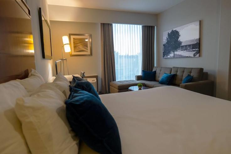 Sala de estar elegantemente projetada com móveis modernos em um apartamento no Building Boulevard Canuto Ibarra Guerrero - wyndham - 1685815 em Los Mochis, Los Mochis Sala de estar elegantemente projetada com móveis modernos em um apartamento no Building Boulevard Canuto Ibarra Guerrero - wyndham - 1685815 em Los Mochis, Los Mochis