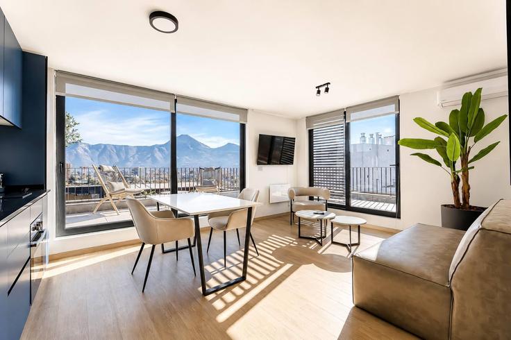 Salle de séjour élégante avec mobilier moderne dans un appartement à Building Avenida Las Condes - wyndham - 1694107 à Las Condes, Santiago Salle de séjour élégante avec mobilier moderne dans un appartement à Building Avenida Las Condes - wyndham - 1694107 à Las Condes, Santiago