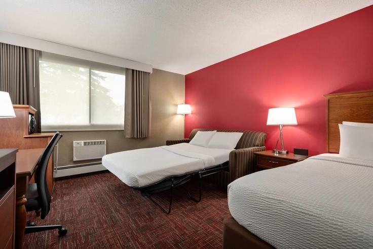Grand Forks, Grand Forks에 위치한 Building North 43rd Street - wyndham - 1652720 유닛의 세련된 인테리어가 돋보이는 거실 Grand Forks, Grand Forks에 위치한 Building North 43rd Street - wyndham - 1652720 유닛의 세련된 인테리어가 돋보이는 거실
