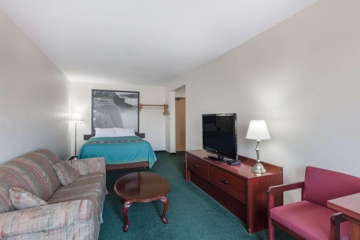 Elegantly designed living room with modern furnishings in an apartment at Building Main Street North - wyndham - 1687697 in Moose Jaw, Moose Jaw Elegantly designed living room with modern furnishings in an apartment at Building Main Street North - wyndham - 1687697 in Moose Jaw, Moose Jaw