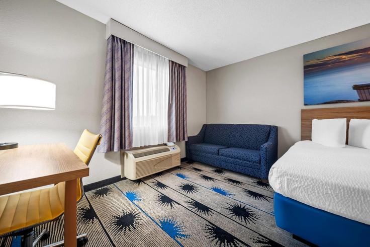 Elegantly designed living room with modern furnishings in an apartment at Building U.S. 231 - wyndham - 1660439 in Troy, Troy
