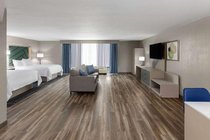 Elegante sala de estar con mobiliario moderno en un apartamento en Building Ruth Street - wyndham - 1664794 en Sulphur, Sulphur Elegante sala de estar con mobiliario moderno en un apartamento en Building Ruth Street - wyndham - 1664794 en Sulphur, Sulphur