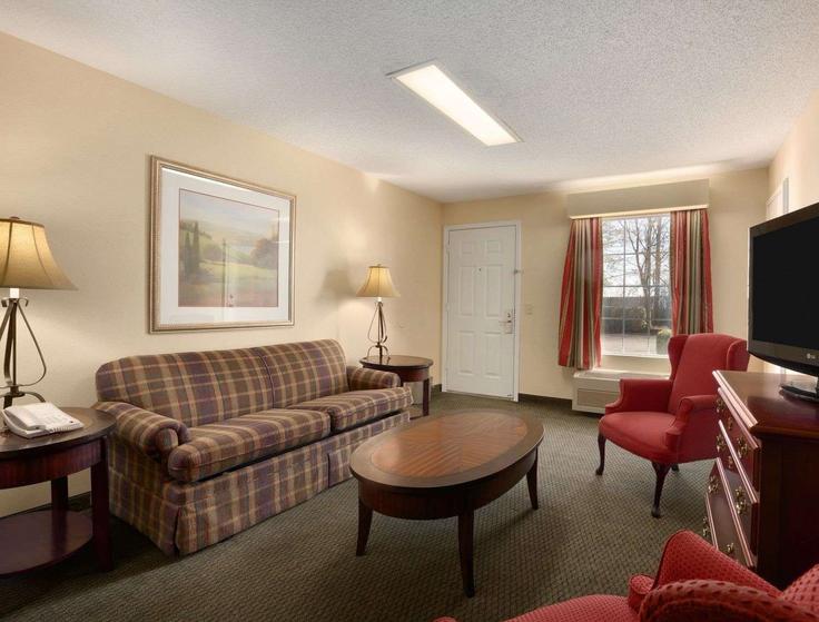 Elegantly designed living room with modern furnishings in an apartment at Building Stuard Street - wyndham - 1661614 in Gaffney, Gaffney